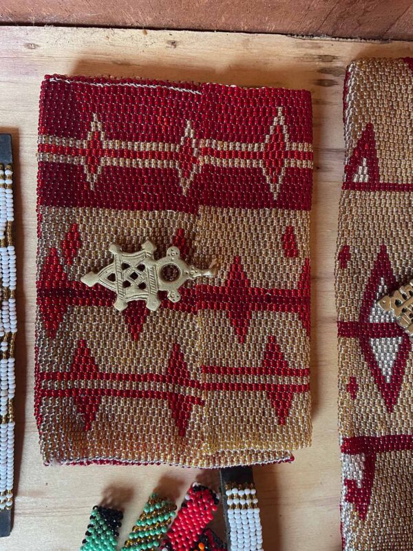 Square red and gold clutch bag with Ethiopian Cross