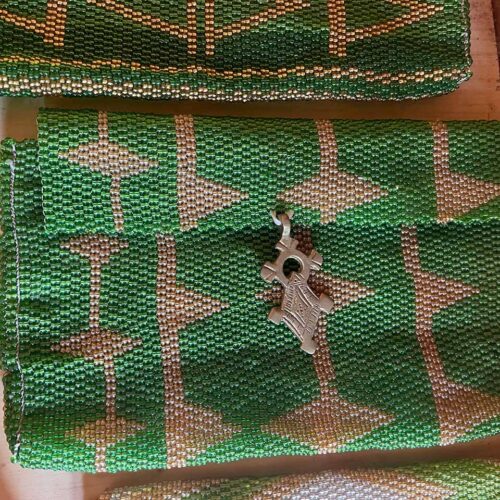 Green and beige clutch bag with Ethiopian cross